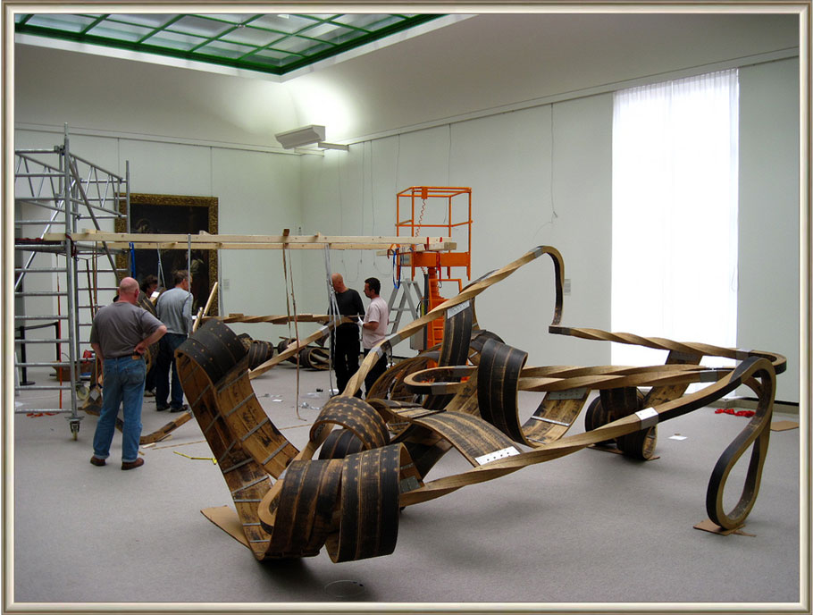 Richard Deacon (b. 1949 in Bangor, Wales, UK). Red Sea Crossing, 2003. Oak and stainless steel. Packaging process  in Stuttgarter Galerieverein, 2010