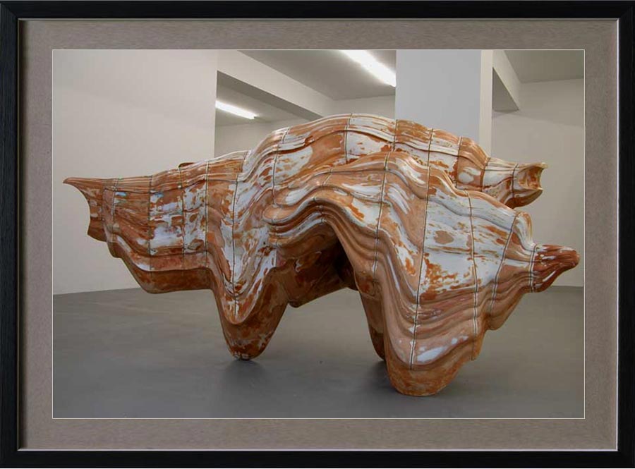 Anthony Cragg (b. 1949 in Liverpool, England. Currently lives in West Germany). Caught Dreaming. 2006. Museum Beelden aan Zee, The Hague. The work is made out of Jesmonite and somehow resembles the body a rhinoceros. As Cragg puts it himself: it forms „a volume of sequential profiles where the orientation of the profile remains the same but, instead of staying parallel to each other, the templates are at angles to one another and provide an impulse for the form to change direction“.