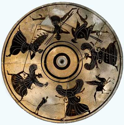 PERSEUS, MEDOUSA & THE GORGONES. Museée du Louvre, Paris, France. Ware: Black Figure (White Ground). Shape: Pyxis. Painter: Attributed to Compare to Haimon Painter. Date: ca 525–475 BC. Period: Archaic. The hero Perseus flees from the scene of the decapitated Gorgon Medousa. He is depicted as a hero armed with two hunting spears, wearing winged boots, a cap, and the kibisis bag containing the head of Medousa. A second almost identical figure (with chlamys cloak) is the god Hermes. Behind the pair follows Athene with her aigis cloak outstretched. The scene shows all three Gorgones, winged maidens with a pair of serpents sprouting from their waists. The middle sister is the decapitated Medousa, from whom is born the boy Khrysaor and the winged foal Pegasos.