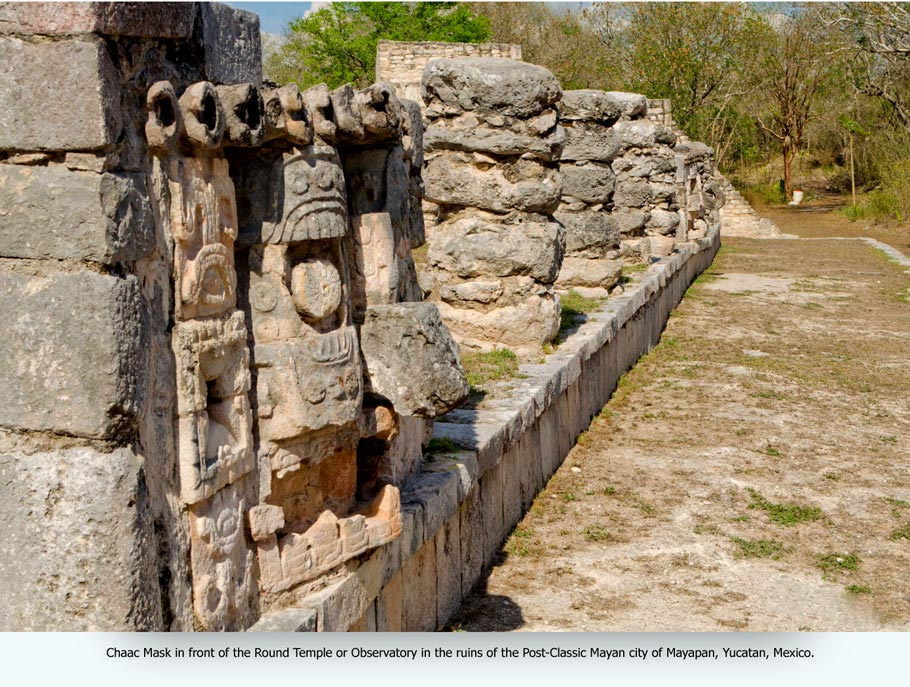 Chaac Mask in front of the Round Temple or Observatory in the ruins of the Post-Classic Mayan city of Mayapan, Yucatan, Mexico. When first painted by Frederick Catherwood in 1843, it was taller, but it was struck by lightning in 1869.